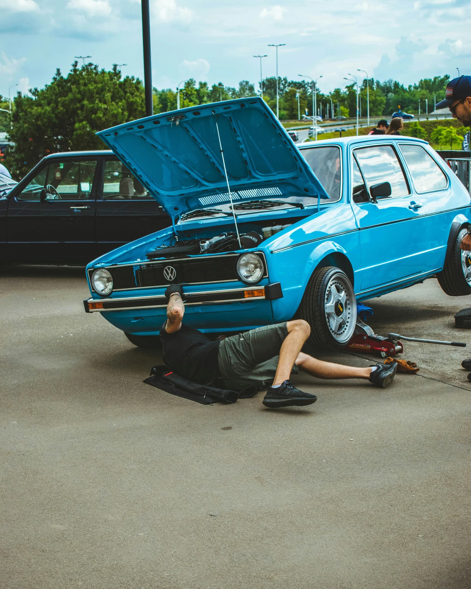 man working on a car